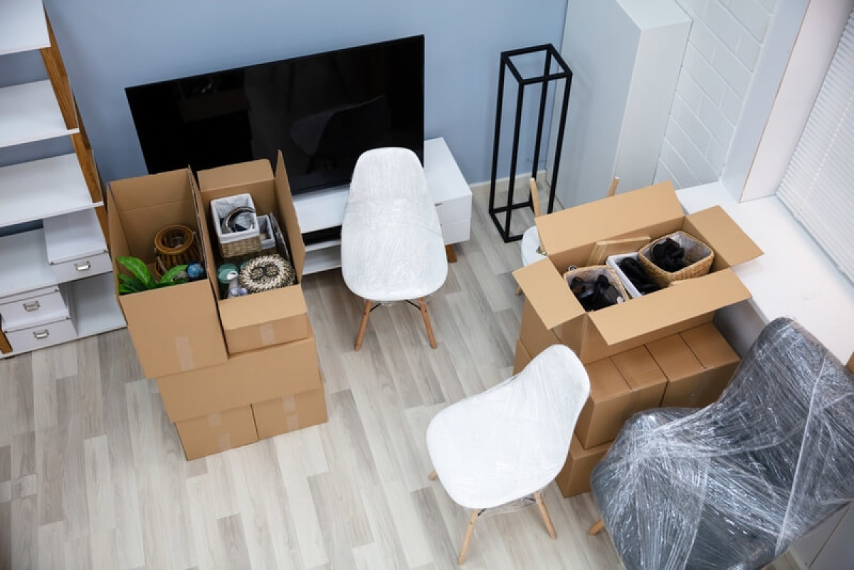 Les niches fiscales immobilières Un déménagement en préparation avec des cartons remplis